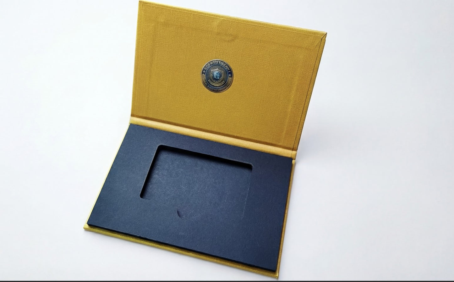 Open book with yellow cover and blue interior on a white background
